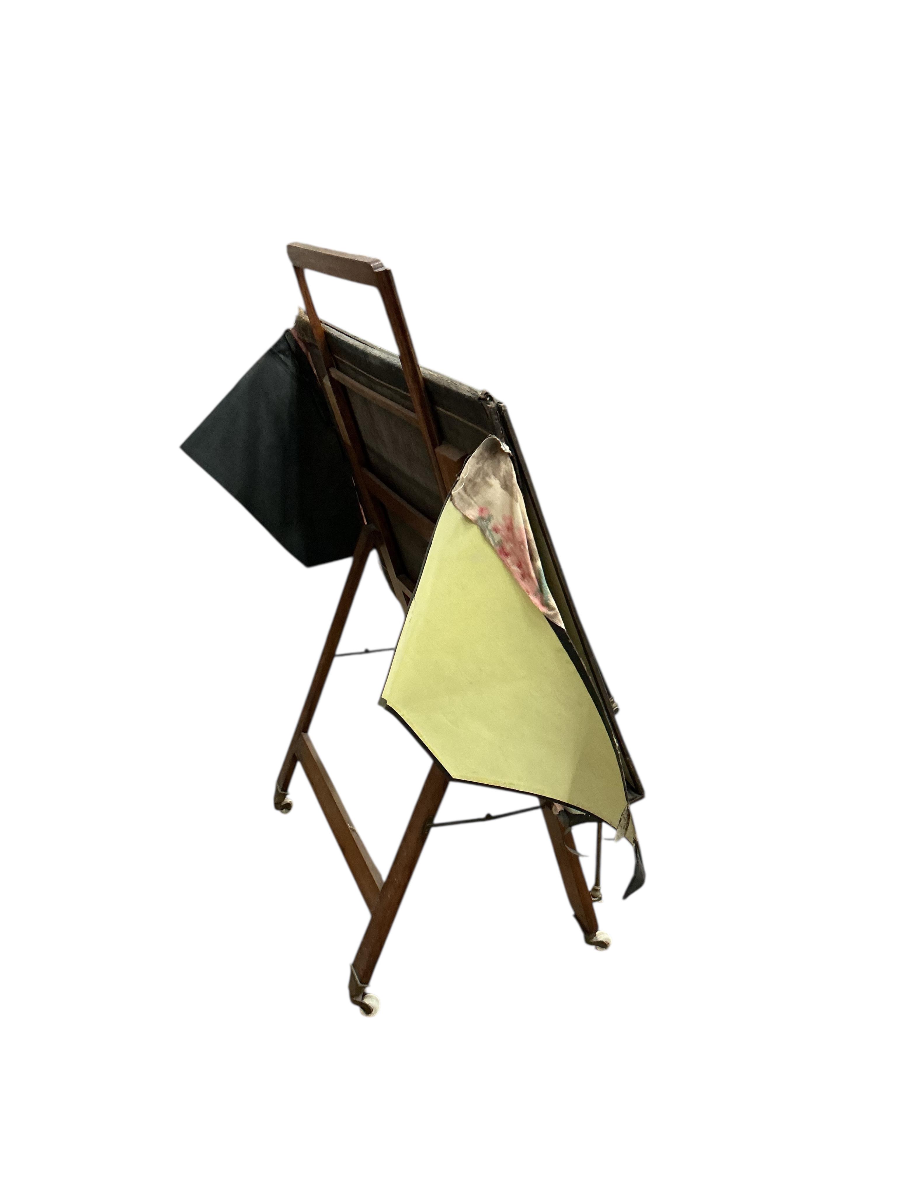 A Victorian brass mounted oak and leather portfolio stand, width 92cm, height 111cm
